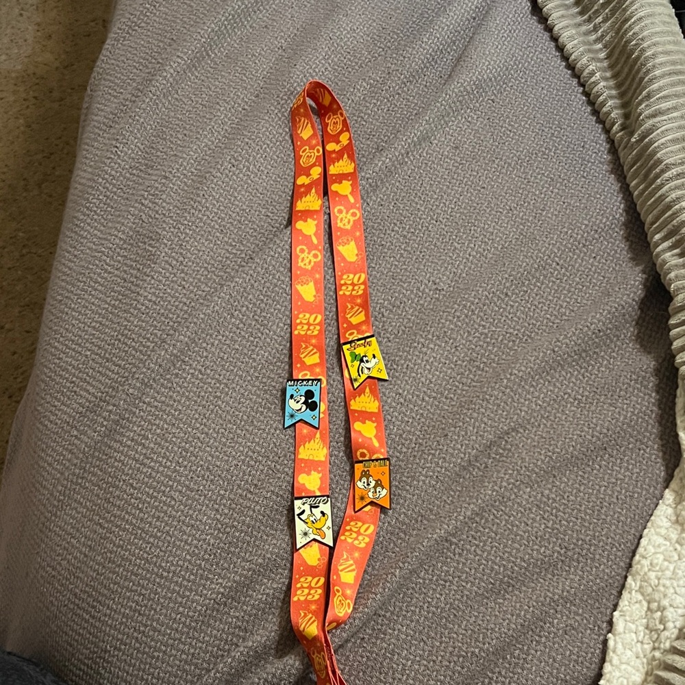 Disney 2023 Favorites Lanyard with Four retro style pins! Never been used!!